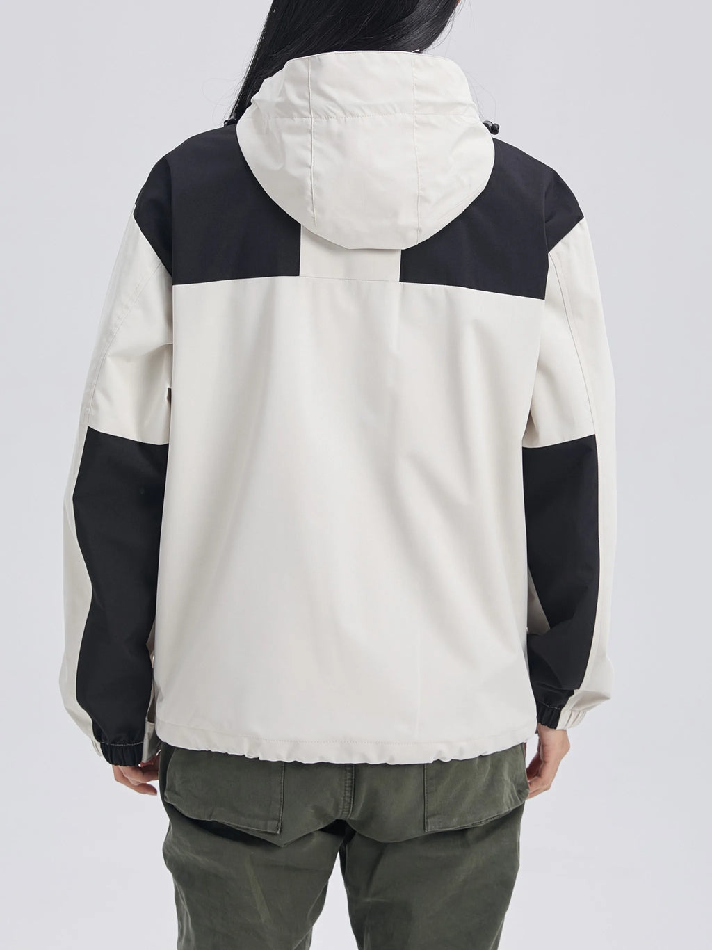 Detail shot of the jacket's hood and stand-up fleece collar with front zip fastening