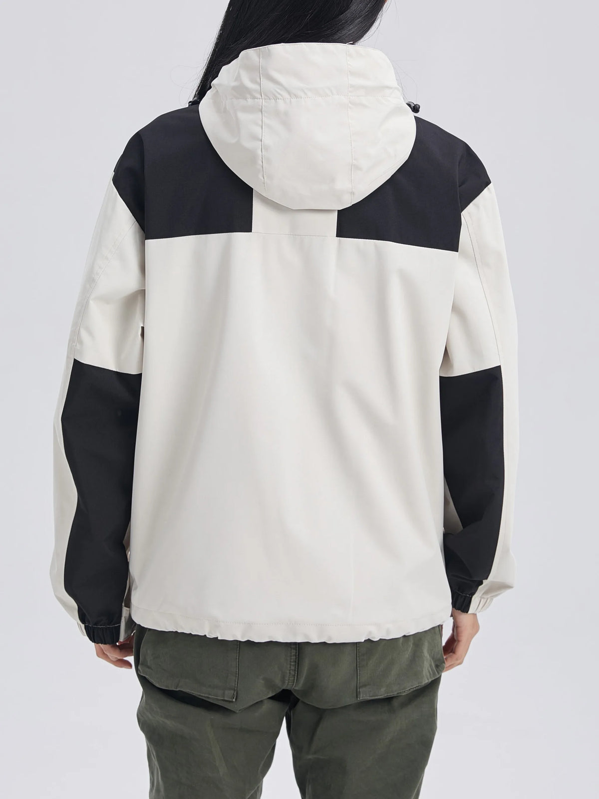 Detail shot of the jacket's hood and stand-up fleece collar with front zip fastening