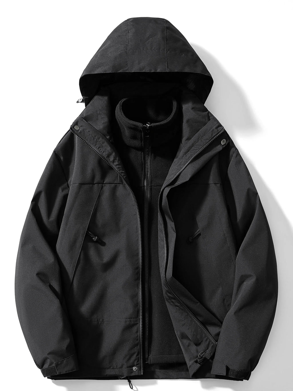 Black hooded 3-in-1 jacket laid flat and unzipped, revealing the zip-in fleece liner with stand collar