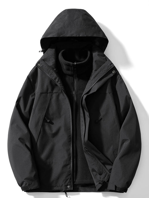 Black hooded 3-in-1 jacket laid flat and unzipped, revealing the zip-in fleece liner with stand collar