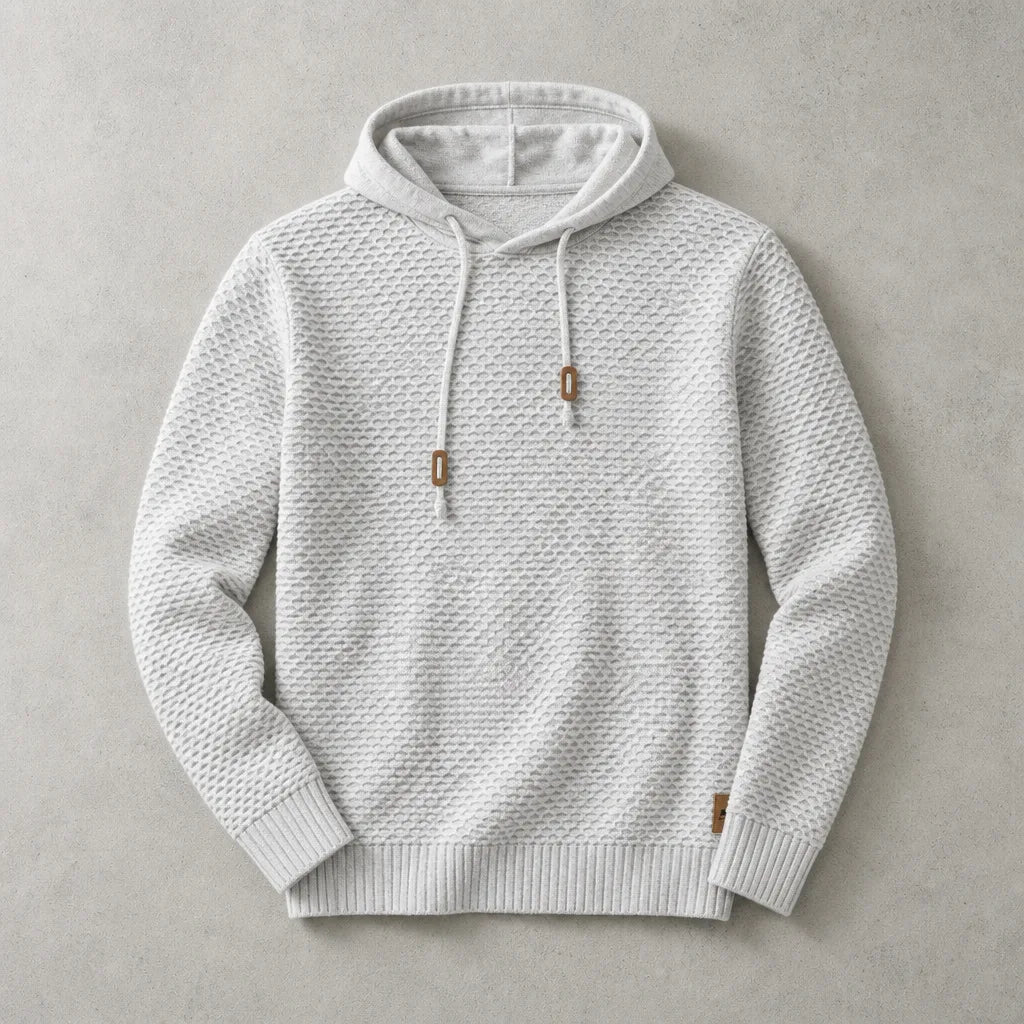 Light grey marl knit pullover hoodie laid flat, showing the woven texture and matching drawstrings