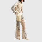Model wearing the wide-leg jeans with a matching cropped jacket, side angle, full outfit