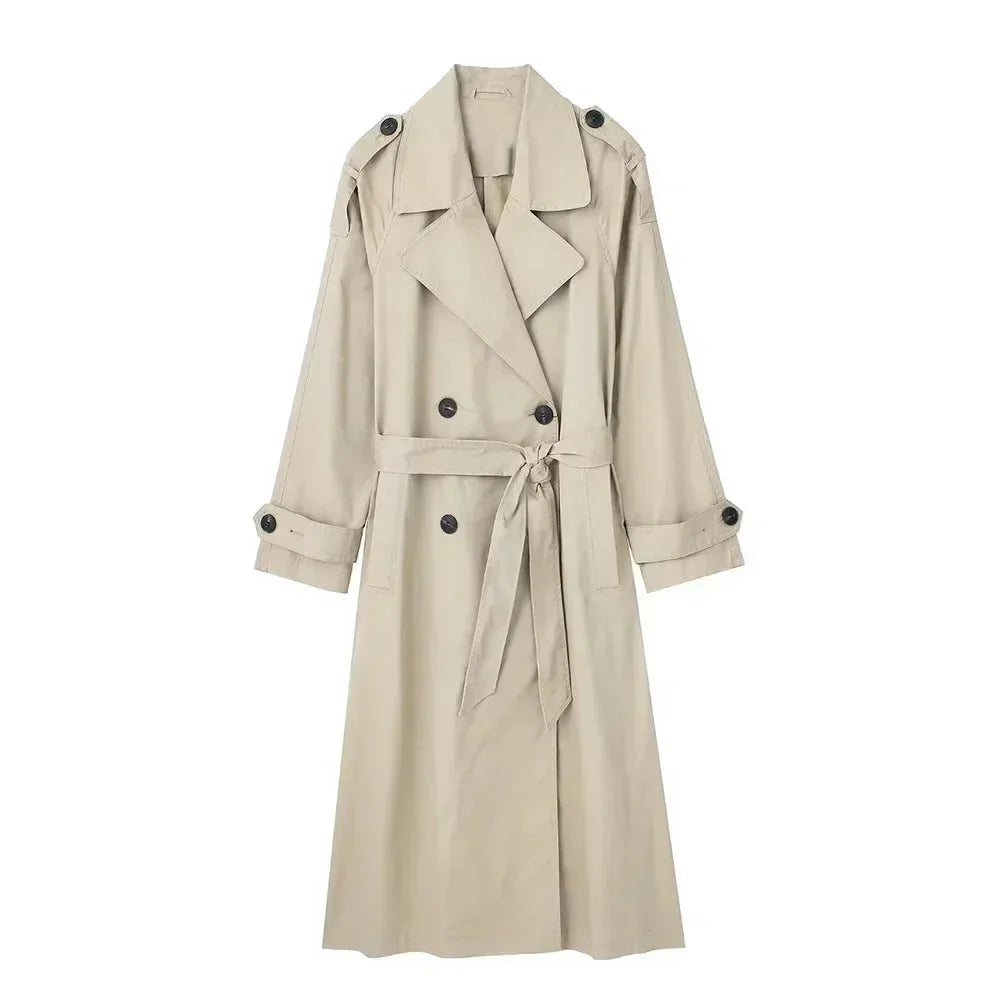 Beige double-breasted trench coat with wide lapel collar and tied waist belt, front view on model