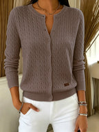 Coffee brown cable knit cardigan with button fastening, front view showing ribbed collar and brand label