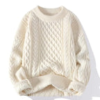 Cream cable-knit jumper with ribbed crew neck, laid flat to show the raised diamond and braid stitch pattern