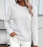White cable-knit crew-neck jumper showing raglan sleeve seams and textured cable pattern