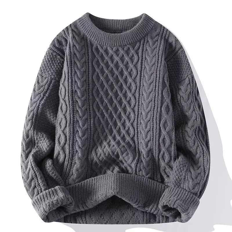 Grey cable-knit jumper with ribbed trim, front view showcasing the classic cable and diamond stitching