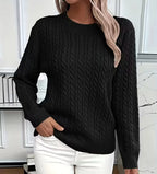 Black cable-knit crew-neck jumper with visible cable texture across the chest and sleeves