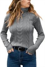 Light brown cable-knit polo neck jumper, close-up of cable knit texture on chest