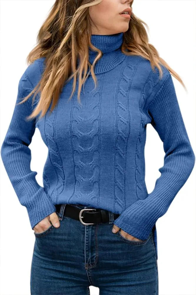 Dark green cable-knit polo neck jumper, model with hands in jean pockets and belt visible
