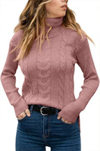 Pink cable-knit polo neck jumper, close crop showing sleeve and shoulder ribbing