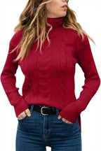 Apricot cable-knit polo neck jumper, close-up of textured knit at centre front