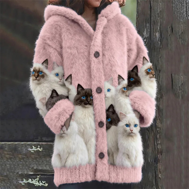 Pink faux fur hooded cardigan with cat print panels and dark button fastenings, close front view