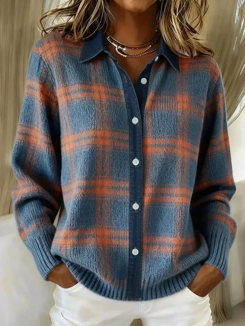 Close-up of blue and orange checked knit shirt jacket with collar, button front and ribbed cuffs, worn open at neck