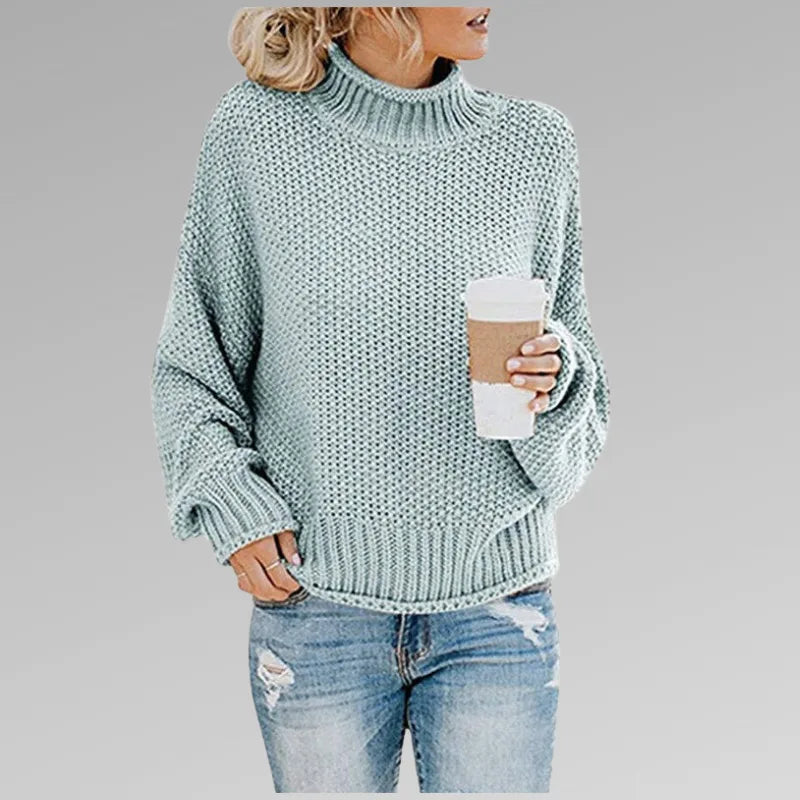Sage green knit polo neck jumper with textured stitch pattern and loose fit