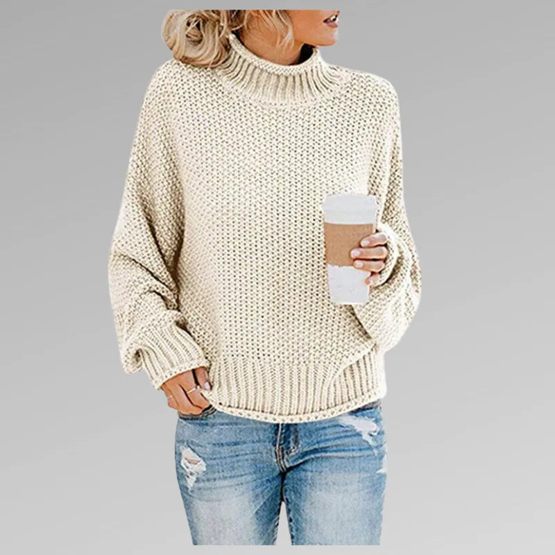 Cream chunky knit jumper with high neck, ribbed hem and relaxed oversized silhouette