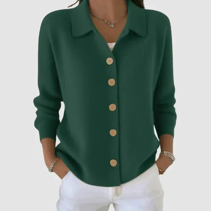 Army green ribbed cardigan with tan wooden buttons and long sleeves, relaxed collared fit