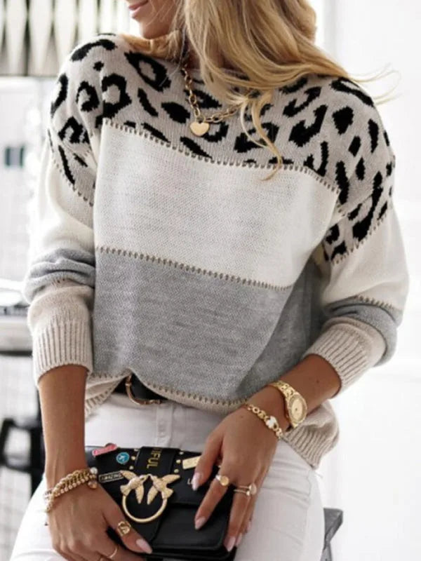 Close-up of the leopard print yoke in grey and cream on a round neck knit jumper