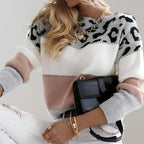 Front view of pink, white and grey colour-block jumper with leopard print shoulders and cuffed sleeves