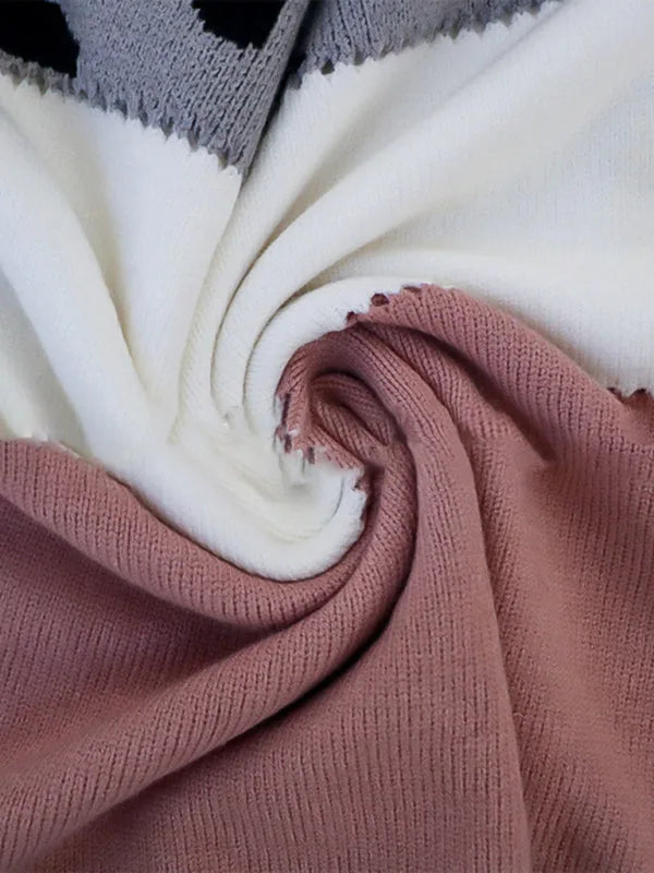 Close-up of the colour-block knit fabric in cream, grey and dusty pink showing the ribbed texture