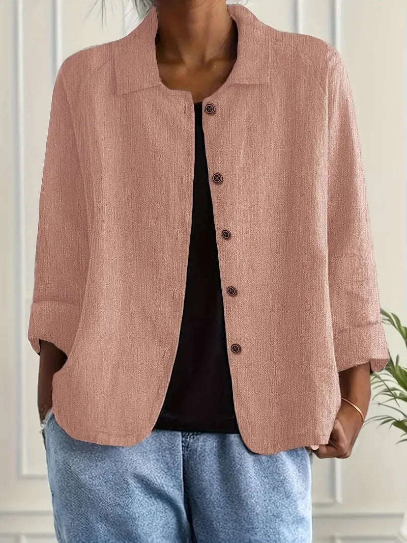 Dusty pink textured cotton-linen shacket worn open, showing collar, front button placket and dropped shoulder seam