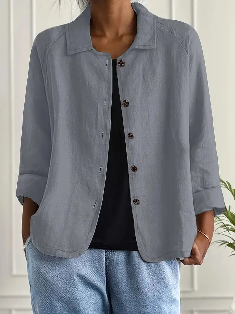 Model in light blue shacket standing with hand in jeans pocket, showing full length and hem shape