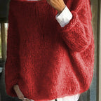 Rich red fuzzy knit jumper shown from behind with a relaxed oversized silhouette