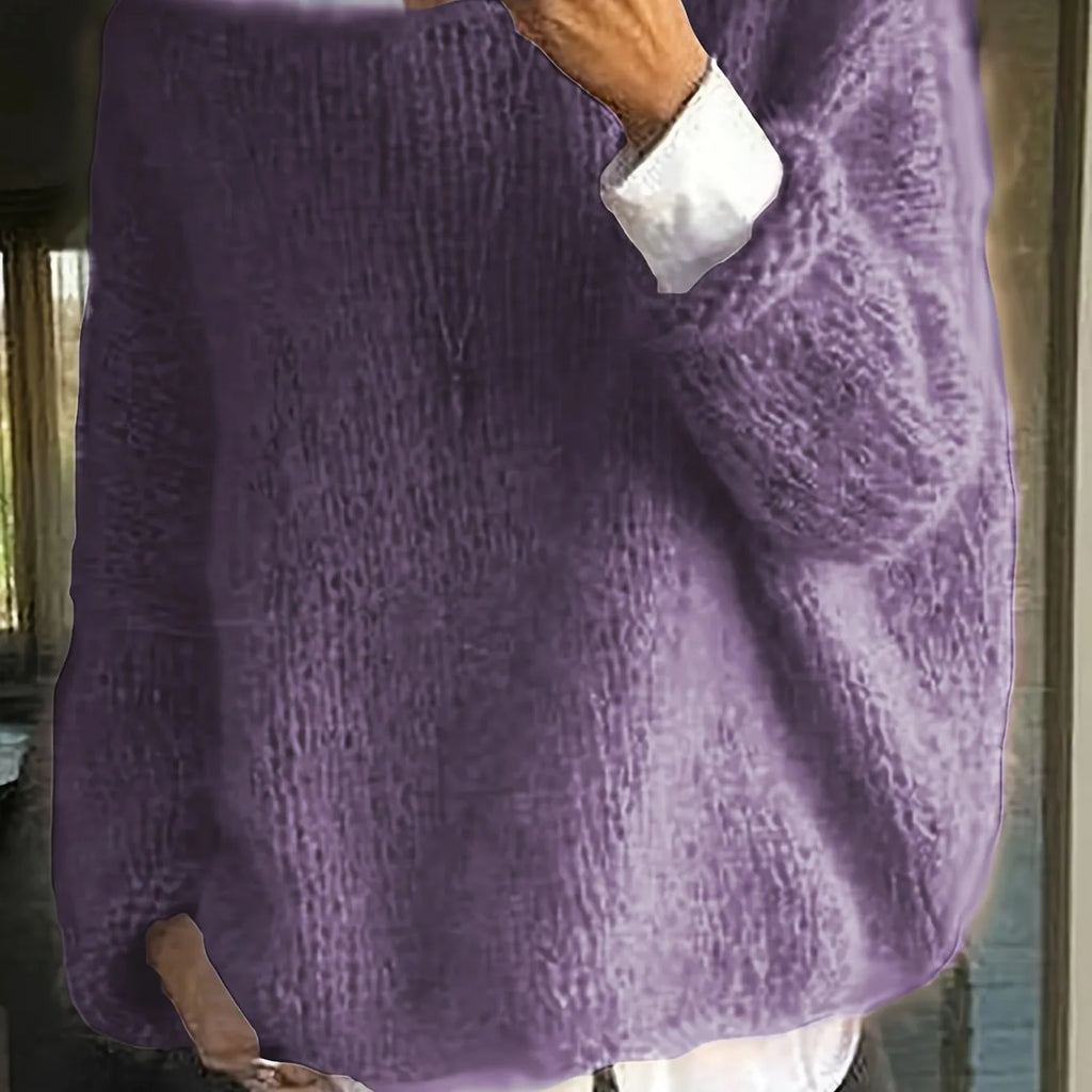 Deep purple textured knit jumper draped loosely over the shoulders with a round neckline