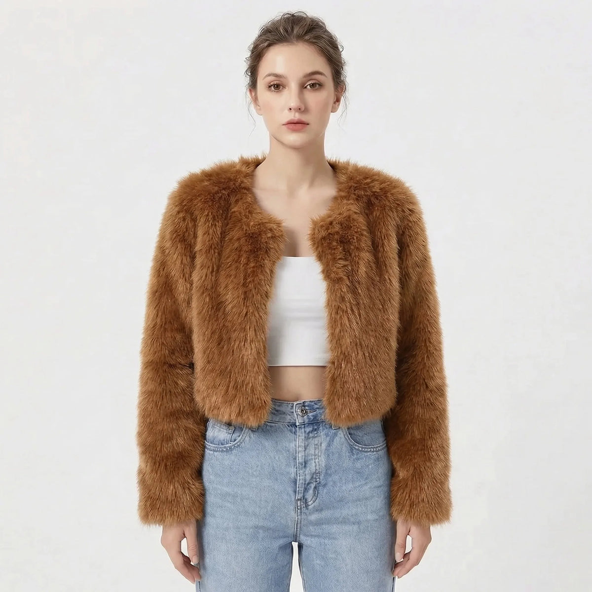 Cropped faux fur jacket in rich curry brown, plush shaggy texture, styled with a white crop top