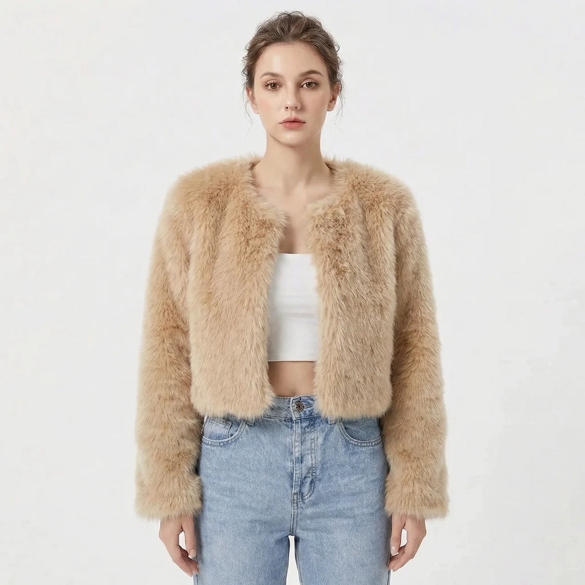 Cropped faux fur jacket in pale sandy curry shade, long sleeves and fluffy texture, front facing view