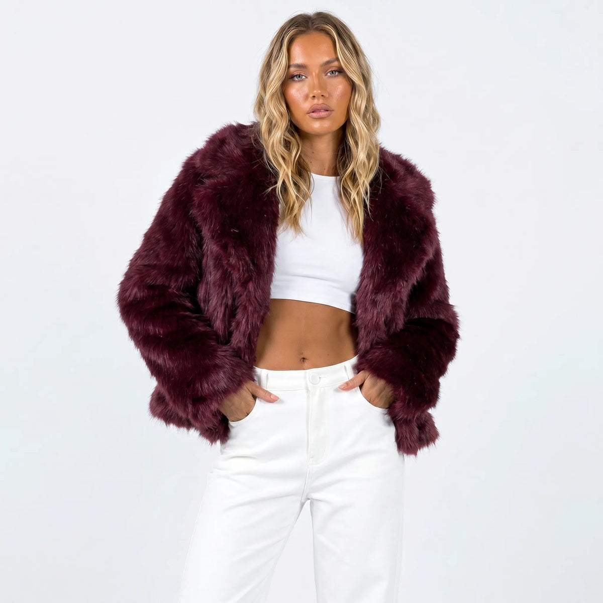 Cropped faux fur jacket in burgundy, front view showing the relaxed bracelet-length sleeves