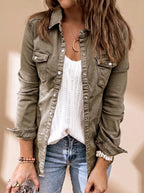 Front view showing the olive green denim jacket fully buttoned with a classic collar and pearl bracelet detail at the cuff