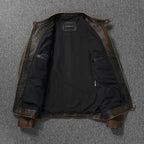 Open brown leather jacket showing black interior lining and inner zip pocket details