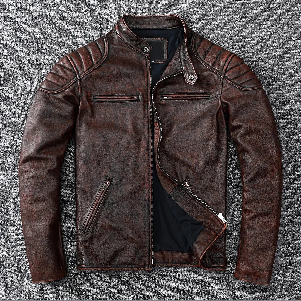 Close-up detail of stitched quilted shoulder panel and worn leather texture in brown finish