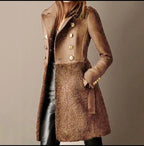 Brown double-breasted coat with gold buttons and plush sherpa lower panel, worn over black leather trousers