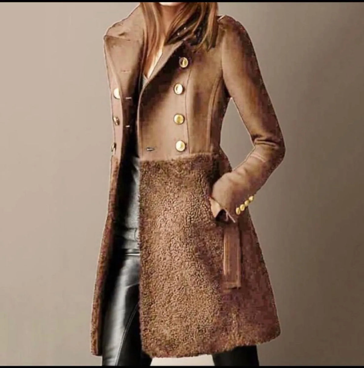 Brown double-breasted coat with gold buttons and plush sherpa lower panel, worn over black leather trousers