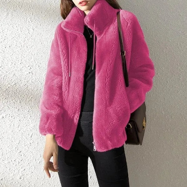 Hot pink faux fur jacket shown open at the front, highlighting the plush texture and relaxed silhouette