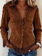 Rich brown faux suede western shirt with fringe detailing along the yoke and cuffs, front view