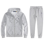 Light grey marl full-zip hoodie and jogger set with navy embroidered logo, shown flat