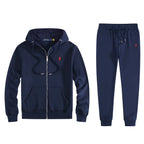 Navy full-zip hooded tracksuit with red embroidered logo, hoodie and jogger bottoms laid flat