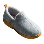 Side profile of a light grey marled slip-on slipper with a tan sole and heel pull tab