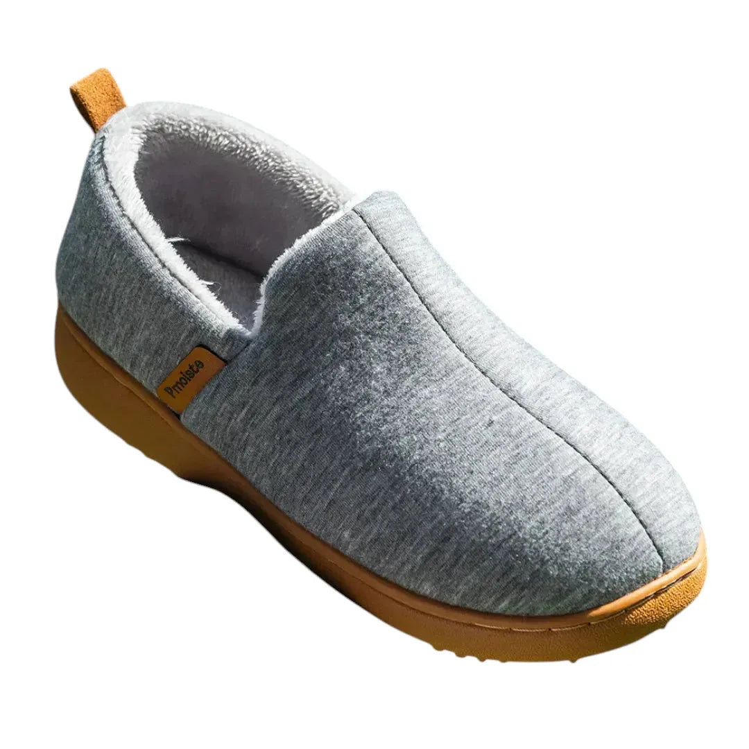 Side profile of a light grey marled slip-on slipper with a tan sole and heel pull tab