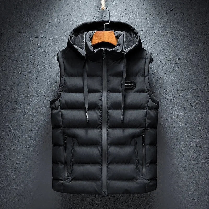 Black fleece-lined hooded gilet with chest badge and zipped side pockets, front view on hanger