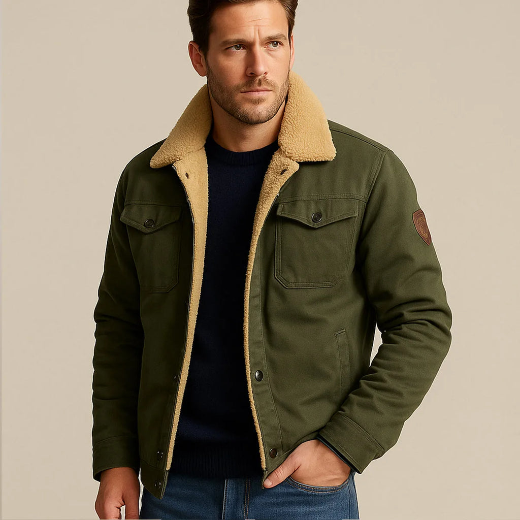 Man wearing the jacket with sherpa collar turned up, hand resting at the collar