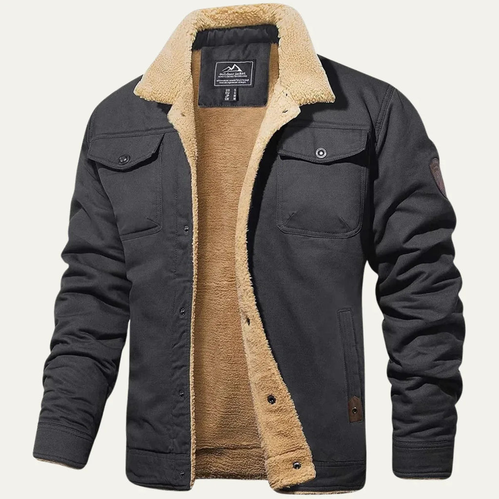 Front view of a dark grey fleece-lined jacket with sherpa collar and flap chest pockets