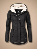 Black hooded parka with drawstring toggles at the hood and cream fleece lining, front zip half open