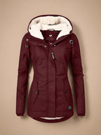 Burgundy hooded parka with drawstring toggle details and fleece-lined hood, shown from the front