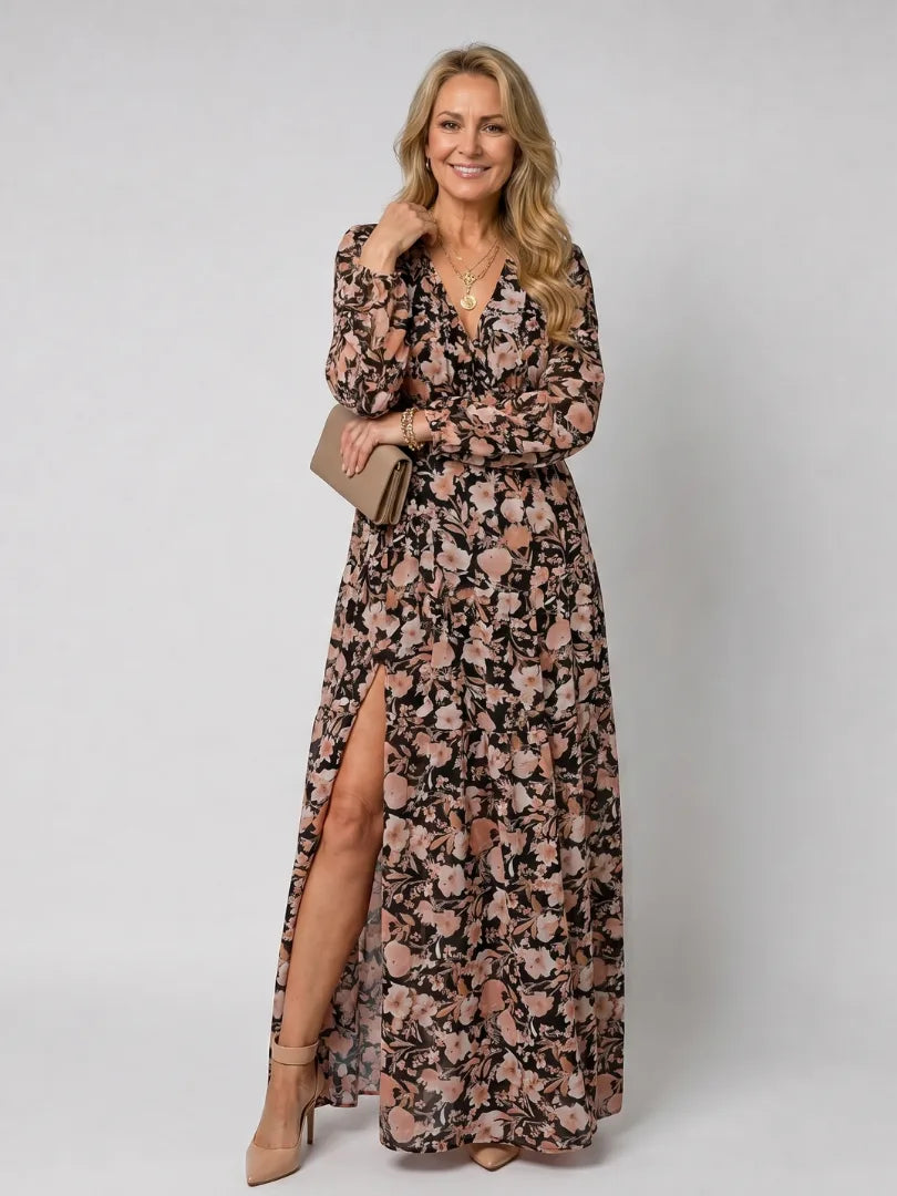 Black and pink floral maxi dress with long sleeves, ruffled neckline and a thigh-high side split