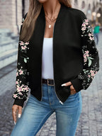 Close-up of the bomber jacket's baseball collar, zip fastening and floral sleeve detail