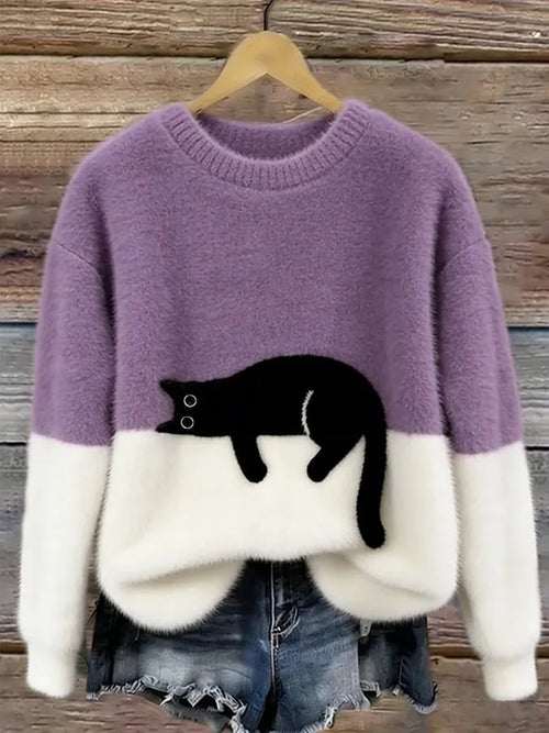 Purple and cream colour-block jumper with fuzzy black cat appliqué at the waistline, hung on a wooden hanger